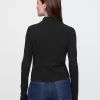 Fjäderlätt turtleneck-topp