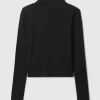 Fjäderlätt turtleneck-topp
