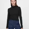 Fjäderlätt turtleneck-topp