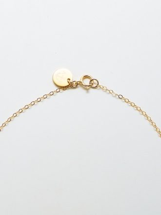 Halsband av halvmåne i guld