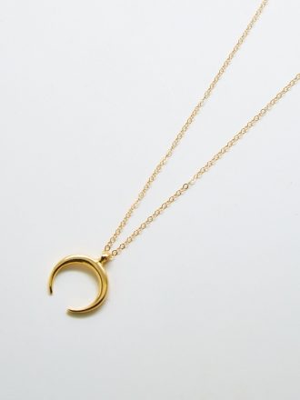 Halsband av halvmåne i guld