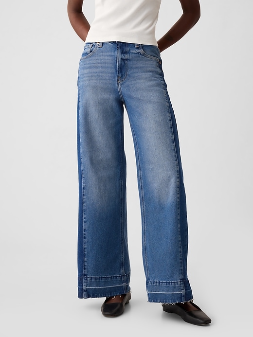 Jeans med vida ben med hög resning Jeans med vida ben med hög resning
