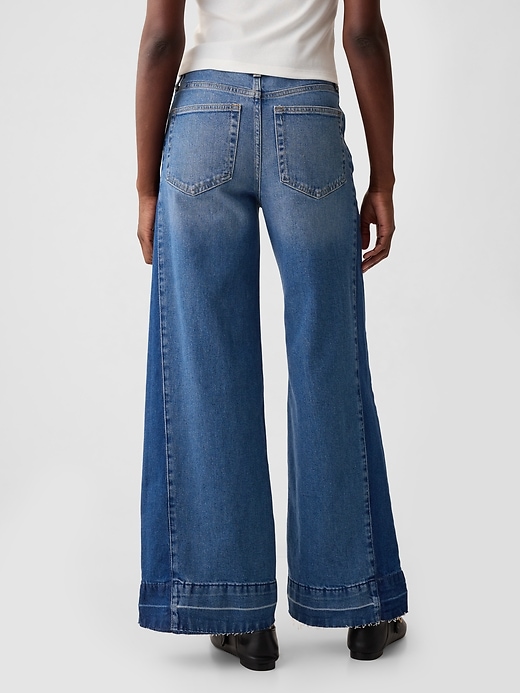 Jeans med vida ben med hög resning Jeans med vida ben med hög resning