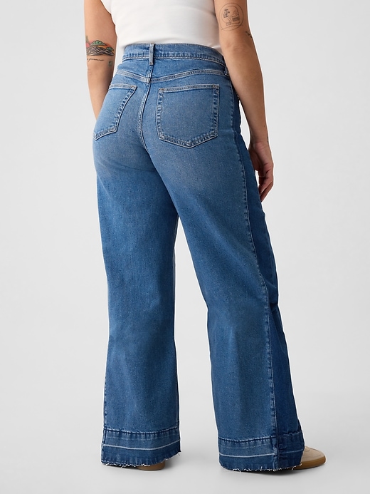 Jeans med vida ben med hög resning Jeans med vida ben med hög resning