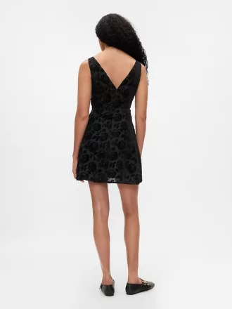 Sammetsblommig miniklänning