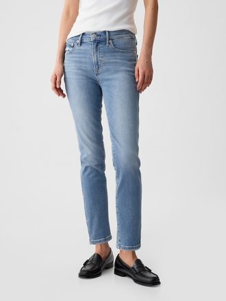 Vintage smala jeans med delad fåll i medelhög höjd