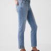 Vintage smala jeans med delad fåll i medelhög höjd