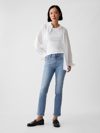 Vintage smala jeans med delad fåll i medelhög höjd