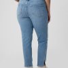 Vintage smala jeans med delad fåll i medelhög höjd