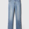 Vintage smala jeans med delad fåll i medelhög höjd